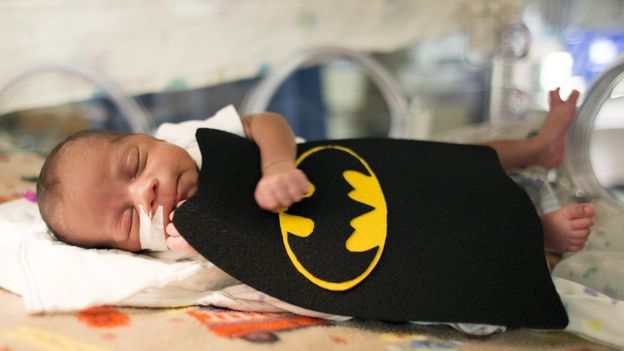Baby in a Batman costume