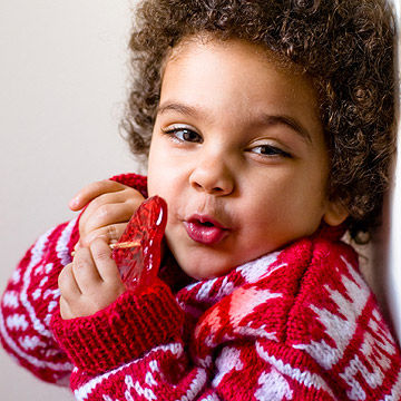 Child eating lollipop