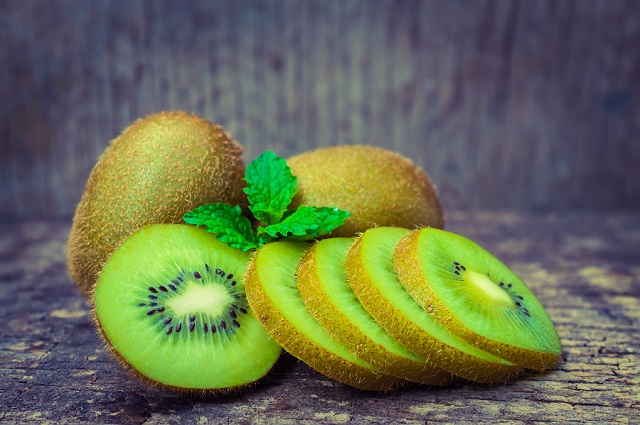 bigstock Close Up Fresh Kiwi Fruit On O 117832748