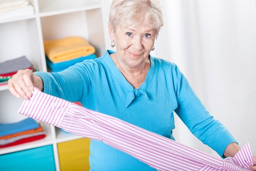 bigstock Elderly Woman During Folding L 60604472