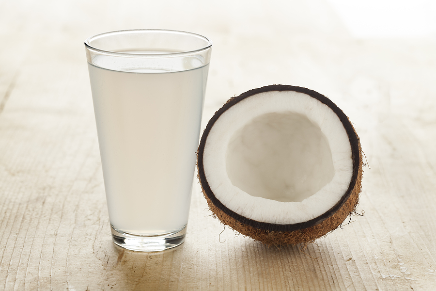 Coconut with a glass of water
