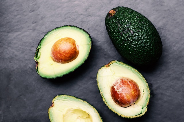 bigstock fresh Green Avocado Over Wo 113972519