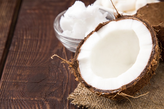 bigstock Coconut With Coconut Oil In Ja 173590901