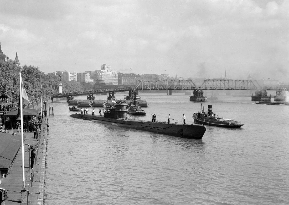 Surrendered German U-boat U776 moors at Westminster Pier, on the River Thames, London, May 22, 1945, where Londoners will be able to inspect her later in the week.  (AP Photo)
