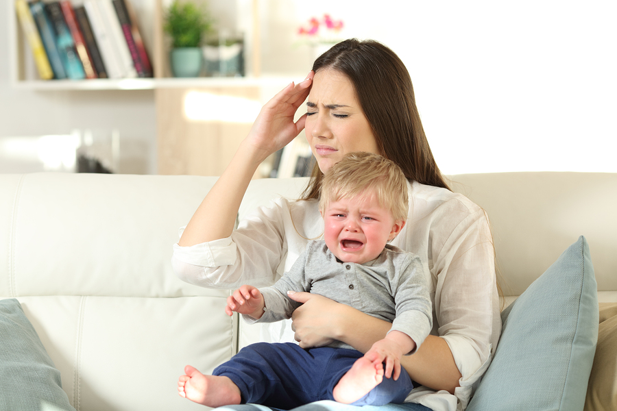 bigstock Mother Suffering And Baby Cryi 226169644