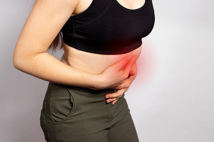 A Womans Stomach Hurts. Abdominal Pain Due To Gastritis, Stomach Ulcers And Crohns Disease. Diseases