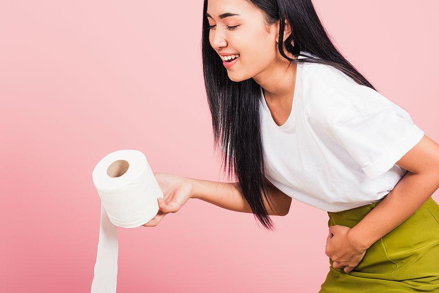 Portrait Of Asian Beautiful Young Woman Diarrhea Constipation Holding Stomachache And Tissue Toilet