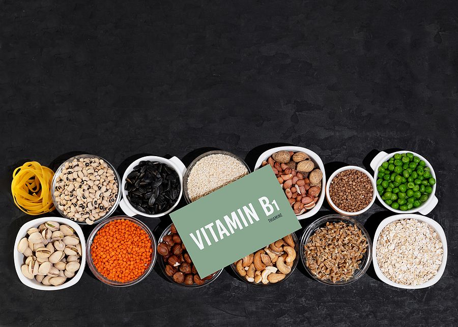 A Set Of Natural Products Rich In Vitamin B1 Thiamine. Healthy Food Concept. Cardboard Sign With The
