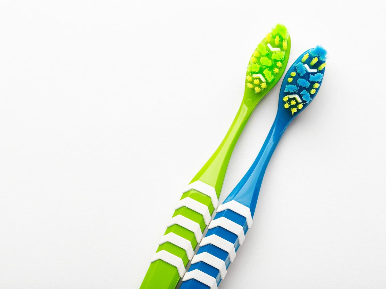 Toothbrushes On A White Background. Concept Toothbrush Selection. Oral Cavity Care. Dental Hygiene.