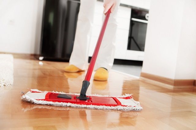 bigstock-House-cleaning-Mopping-hardwo-15356912.jpg