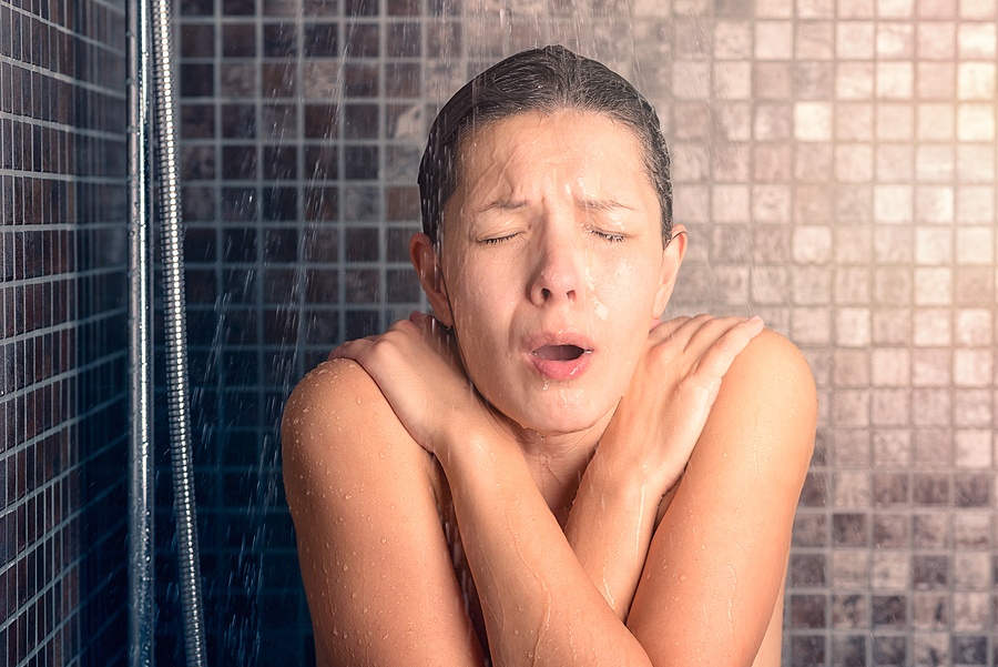 Woman Taking Cold Shower