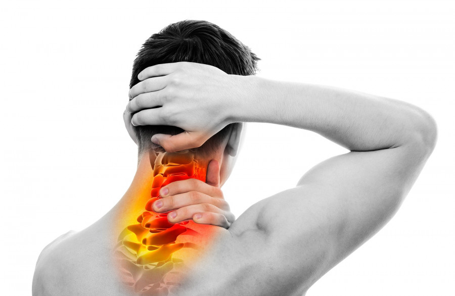 Neck Pain - Male Anatomy Sportsman Holding Head And Neck