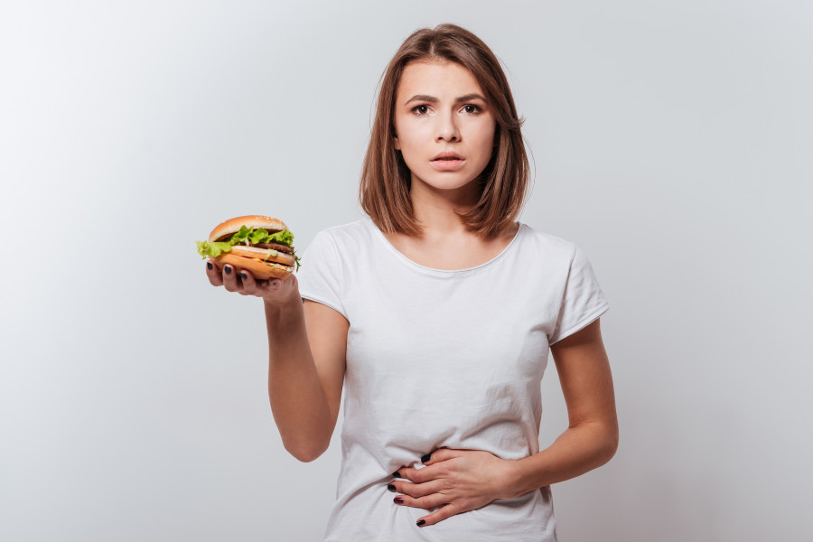 fast-food-pain-burger-stomachache-indigestion